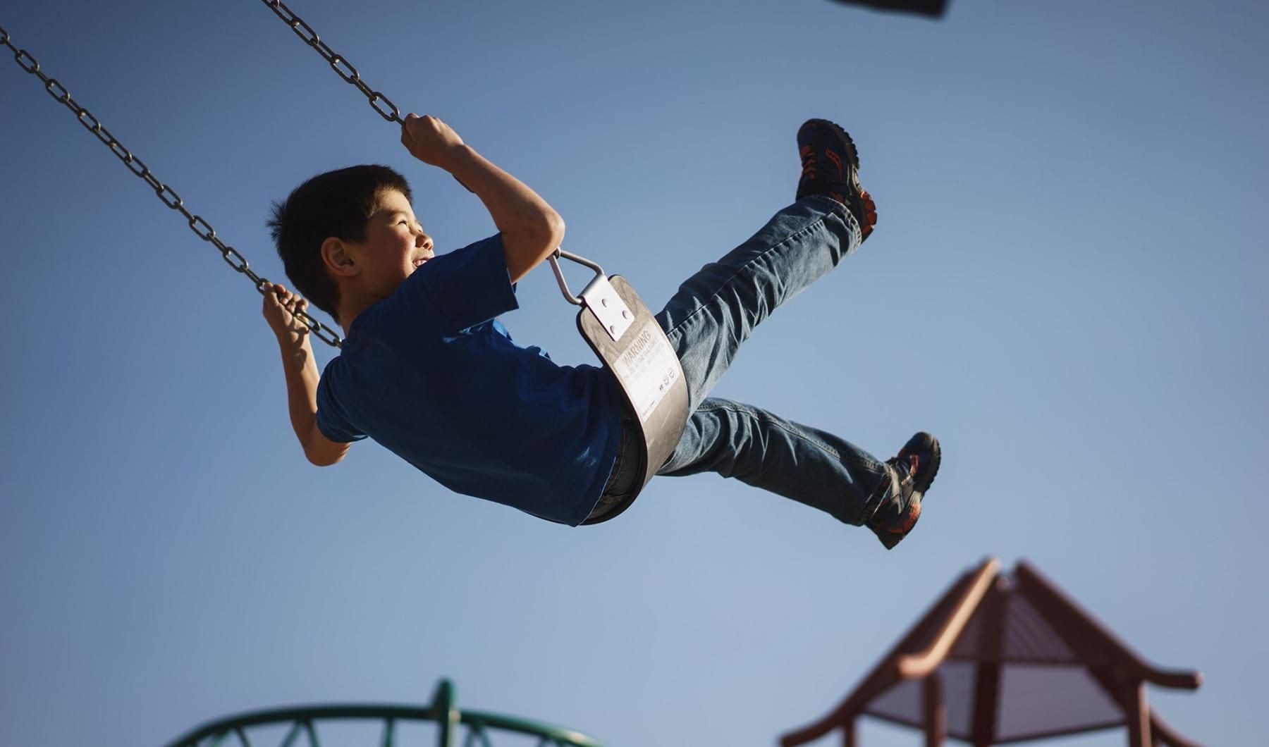 a boy on a swing